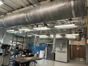 Installed ductwork network for dust collector with drops in middle school tech shop the week of August 29-September 2, 2022.