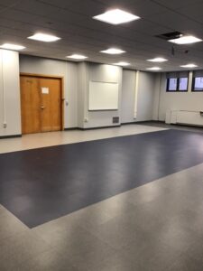 High School chorus room flooring