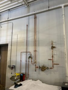 Installed eye-wash station and ran backflow preventer piping at chiller plant at GES the week of January 9-13, 2023.