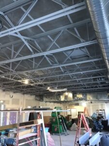Painting the exposed ceiling during the week of January 17-21, 2022.