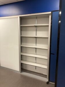 Empty shelves in a classroom